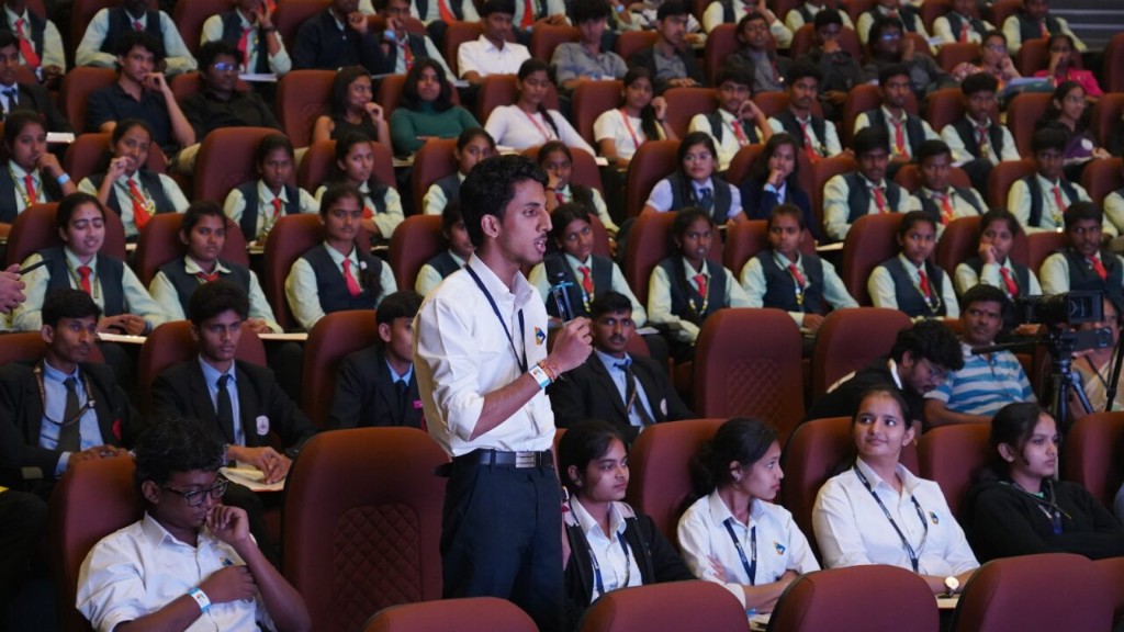 A student asking a question during a Career Uttsav seminar